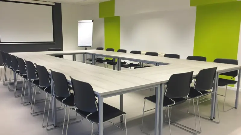 A conference room set up for a workshop
